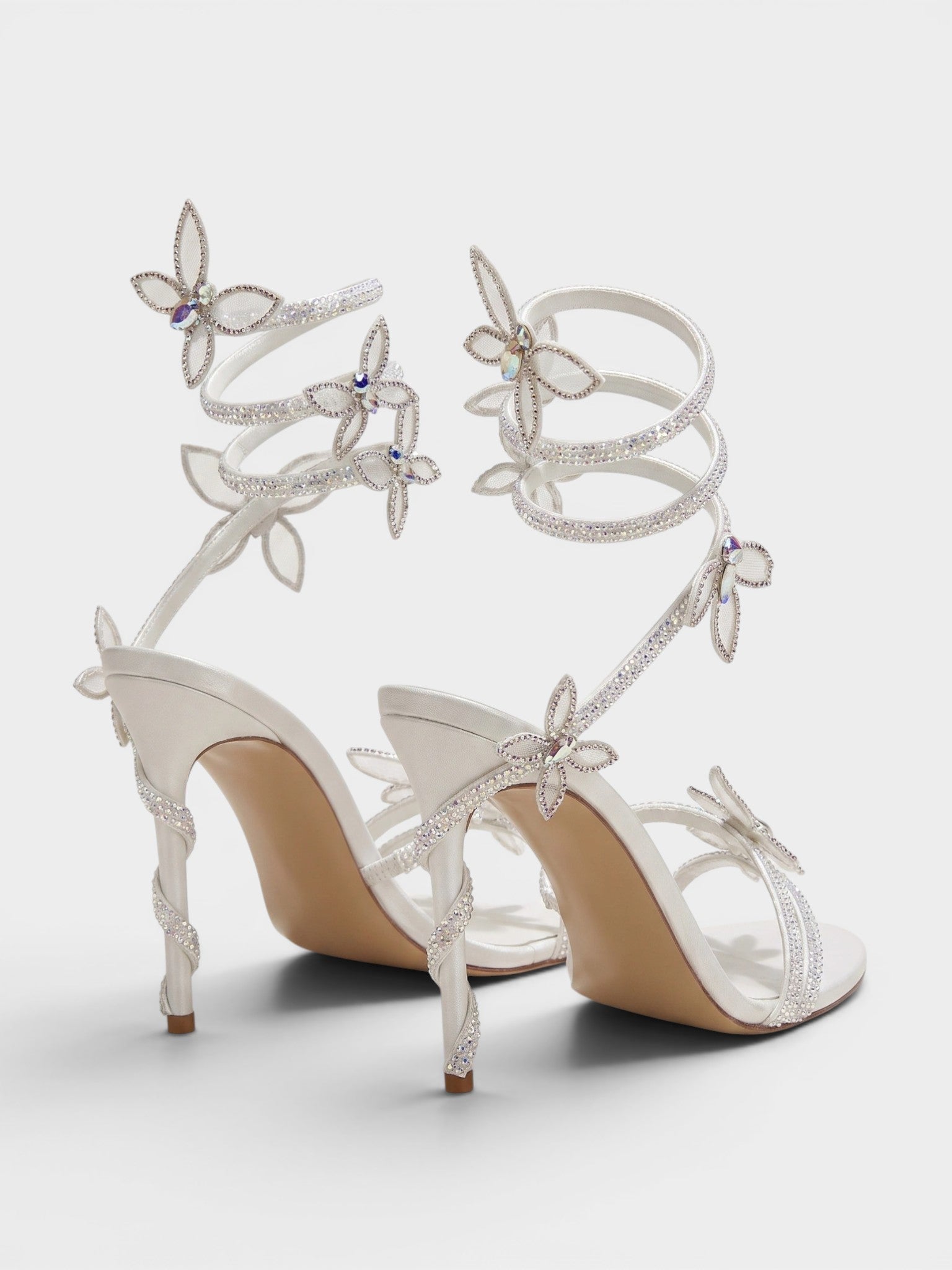 Gleamond | Women's Crystal Embellished Stiletto Sandals with Spiral Ankle Wrap and Butterfly Detail Gleamond